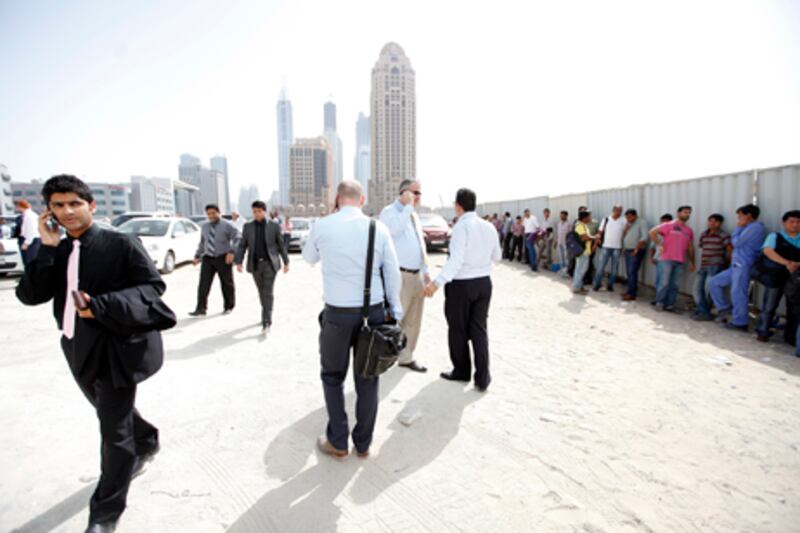 Dubai, April 16 2013 - Buildings in Dubai Media City are evacuated following an earthquake in Dubai, April 16, 2013. (Photo by: Sarah Dea/The National)

