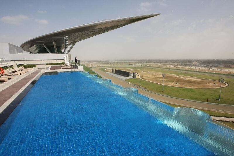 DUBAI.. 27th January 2010. The solar panelled roof of the main granstand at the new Maydan racecourse in Dubai seen from the rooftop swimming pool of the Meydan hotel.   Stephen Lock   /  The National  .  *** Local Caption ***  SL-meydan-019.jpg