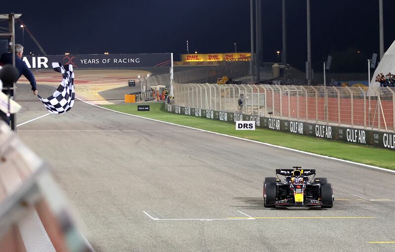 Red Bull Racing driver Max Verstappen takes the chequered flag at Bahrain International Circuit. EPA 