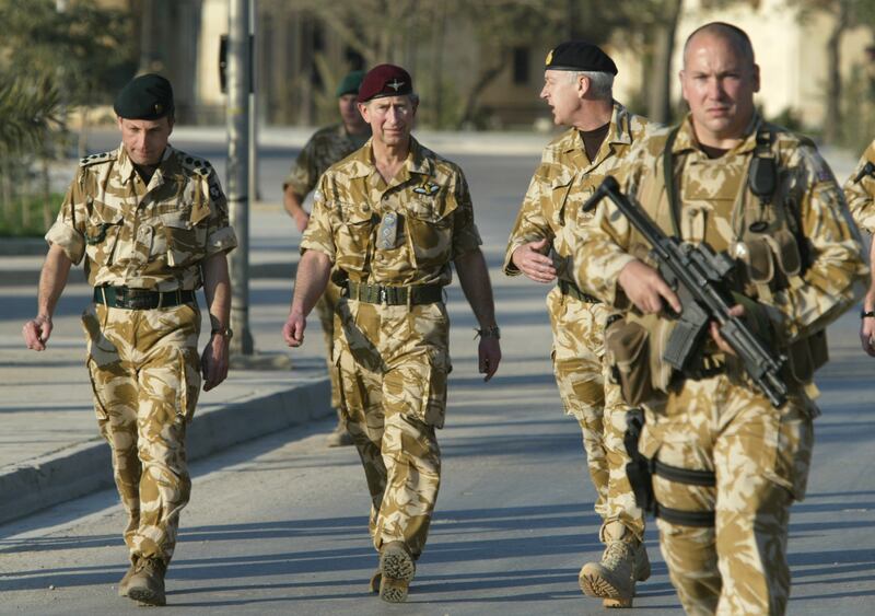 Prince Charles with Maj Gen Andrew Stewart, right, at a British military base in Basra, Iraq, in 2004. Reuters