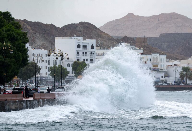 High waves break on the Mutrah promenade in the Omani capital.