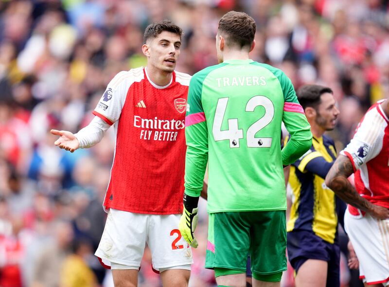 Arsenal's Kai Havertz and Bournemouth goalkeeper Mark Travers argue after the German went down in the box to win penalty. PA