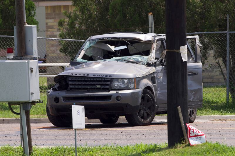 Several migrants were killed after they were struck by a grey Range Rover while waiting at a bus stop. AP