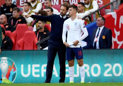 Soccer Football - Euro 2020 Qualifier - Group A - England v Bulgaria - Wembley Stadium, London, Britain - September 7, 2019  England's Mason Mount receives instructions from manager Gareth Southgate before being substituted on  Action Images via Reuters/Tony O'Brien