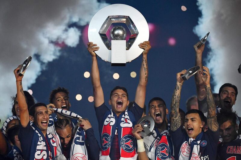 Thiago Silva lifts the Ligue 1 trophy after PSG had won the title in 2019. AFP