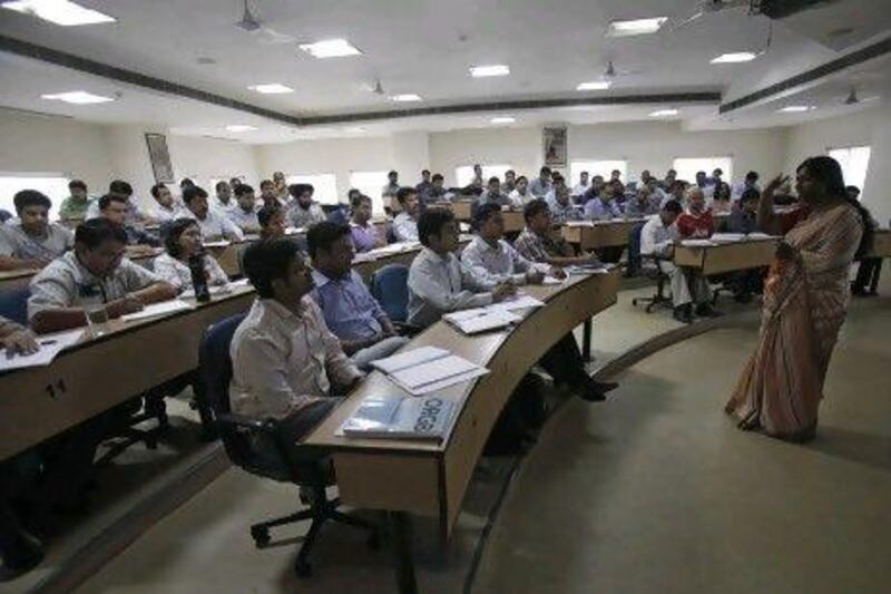 Master of Business Administration (MBA) students attend a lecture at the Management Development Institute (MDI) in Gurgaon, on the outskirts of New Delhi. India’s number of management institutes more than tripled to around 4,000 in the past five years.