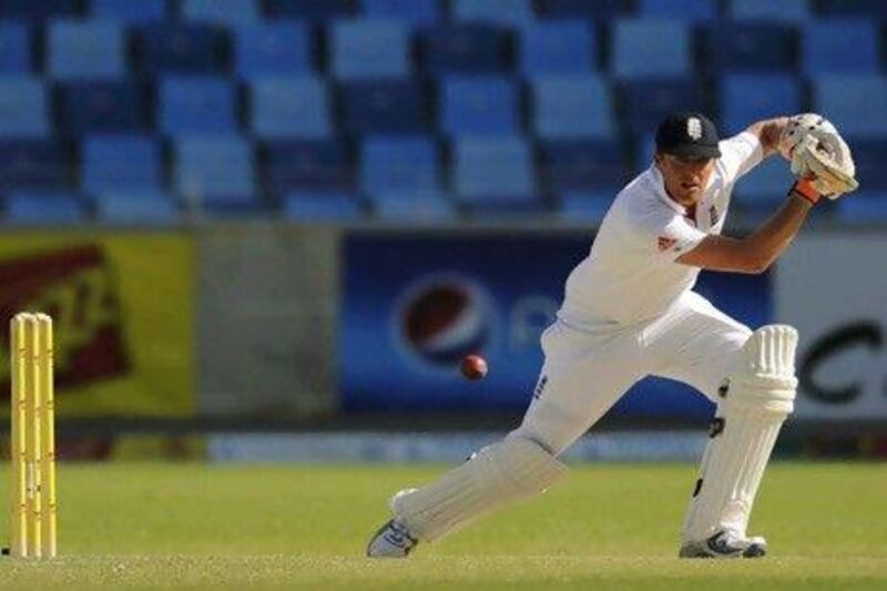 England's Graeme Swann hits out during the morning session against Pakistan in Dubai.