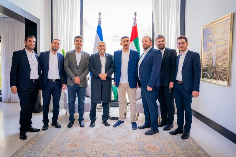 Sheikh Abdullah, pictured fourth from right with Mr Gafni, fifth from right, arrived in Israel on Wednesday to mark the second anniversary of the signing of the Abraham Accords.