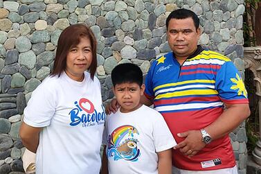 Albert Sabado with wife Mary Joy and their son, Alvin. Picture supplied by family    