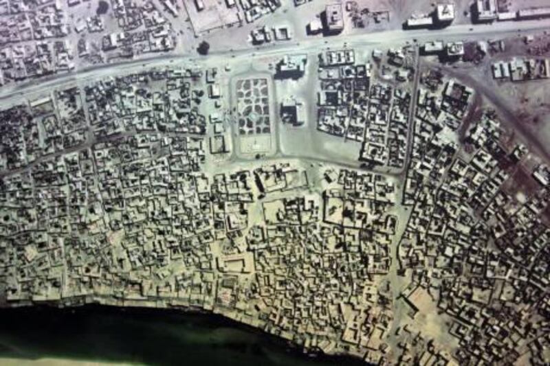 Sharjah preservationists are compiling a list of historical places in the emirate to include in an application for a world heritage site, on a par with Egypt's pyramids and India's Taj Mahal. This picture, from Gulf Antiques, shows Sharjah’s heritage area circa 1955.