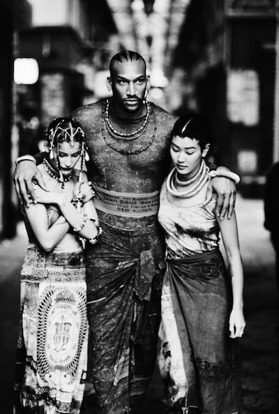 Models Laetitia Casta, Vladimir McCary, Jenny Shimizu take part in the spring summer 1994 collection fashion show Les Tatouages (The Tattoos). Photo: Ellen Von Unwerth