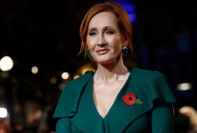 FILE - Author J.K. Rowling appears at the world premiere of the film "Fantastic Beasts: The Crimes of Grindelwald" in Paris on Nov. 8, 2018.  Scholastic announced Tuesday that Rowling's â€œThe Christmas Pig,â€ the story of a boy named Jack and a beloved toy (Dur Pig) which goes missing, will be released worldwide Oct. 12. (AP Photo/Christophe Ena, File)