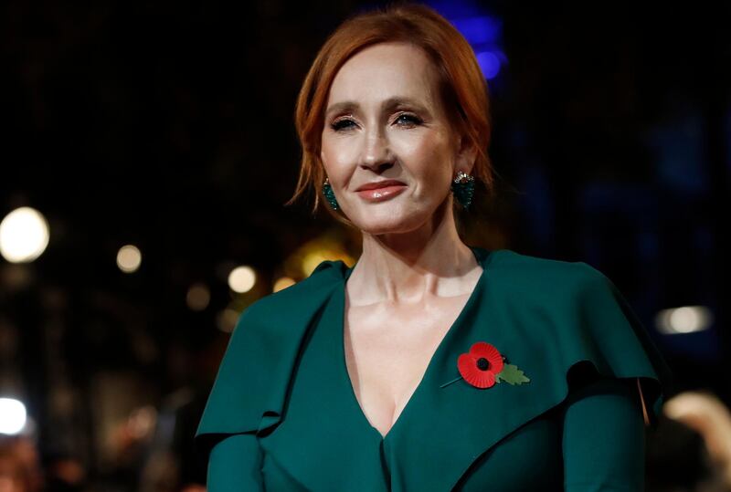 FILE - Author J.K. Rowling appears at the world premiere of the film "Fantastic Beasts: The Crimes of Grindelwald" in Paris on Nov. 8, 2018.  Scholastic announced Tuesday that Rowling's â€œThe Christmas Pig,â€ the story of a boy named Jack and a beloved toy (Dur Pig) which goes missing, will be released worldwide Oct. 12. (AP Photo/Christophe Ena, File)