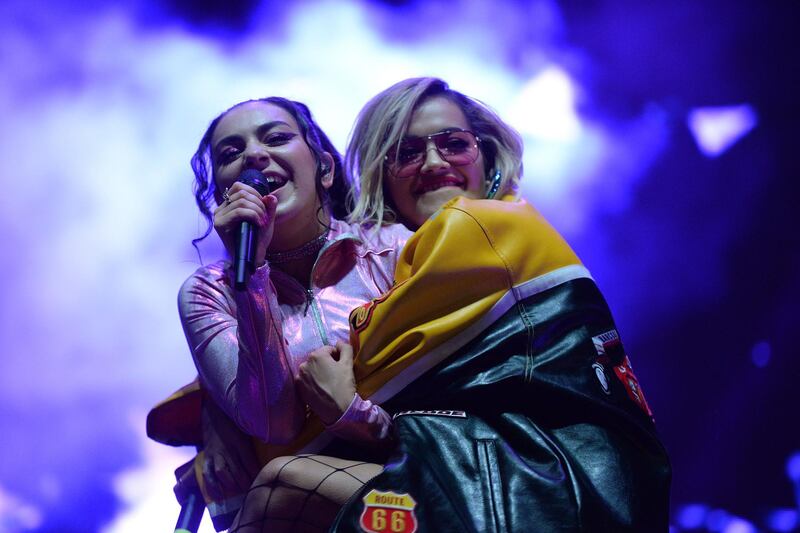 WEST HOLLYWOOD, CA - JUNE 11:  Singers Charli XCX (L) and Rita Ora (R) perform onstage during LA Pride Festival on June 10, 2016 in West Hollywood, California.  (Photo by Scott Dudelson/Getty Images)