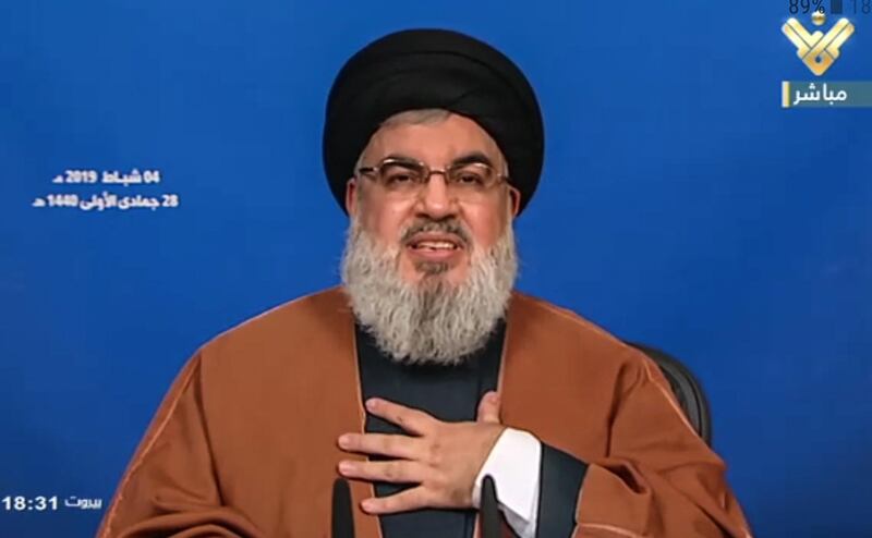 epa07343524 A handout grab photo made available by Hezbollah's al-Manar TV shows Secretary General of Hezbollah, Sayyed Hassan Nasrallah speaking on Al-Manar TV screen where he spoke about the latest political developments in Lebanon and the situation after the new government formed with three Hezbollah ministers, in Beirut, Lebanon, 04 February 2019.  EPA/AL-MANAR TV HANDOUT  HANDOUT EDITORIAL USE ONLY/NO SALES