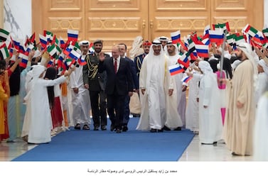 Sheikh Mohamed bin Zayed, Crown Prince of Abu Dhabi and Deputy Supreme Commander of the UAE Armed Forces, hosts a reception for Russian President Vladimir Putin, during a state visit, at Qasr Al Watan. Hamad Al Kaabi / Ministry of Presidential Affairs 