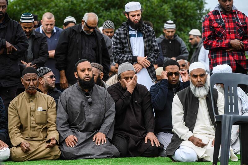 Mourners perform congregational prayers on the sidelines of the funeral of Haji Mohammed Daoud Nabi. AFP