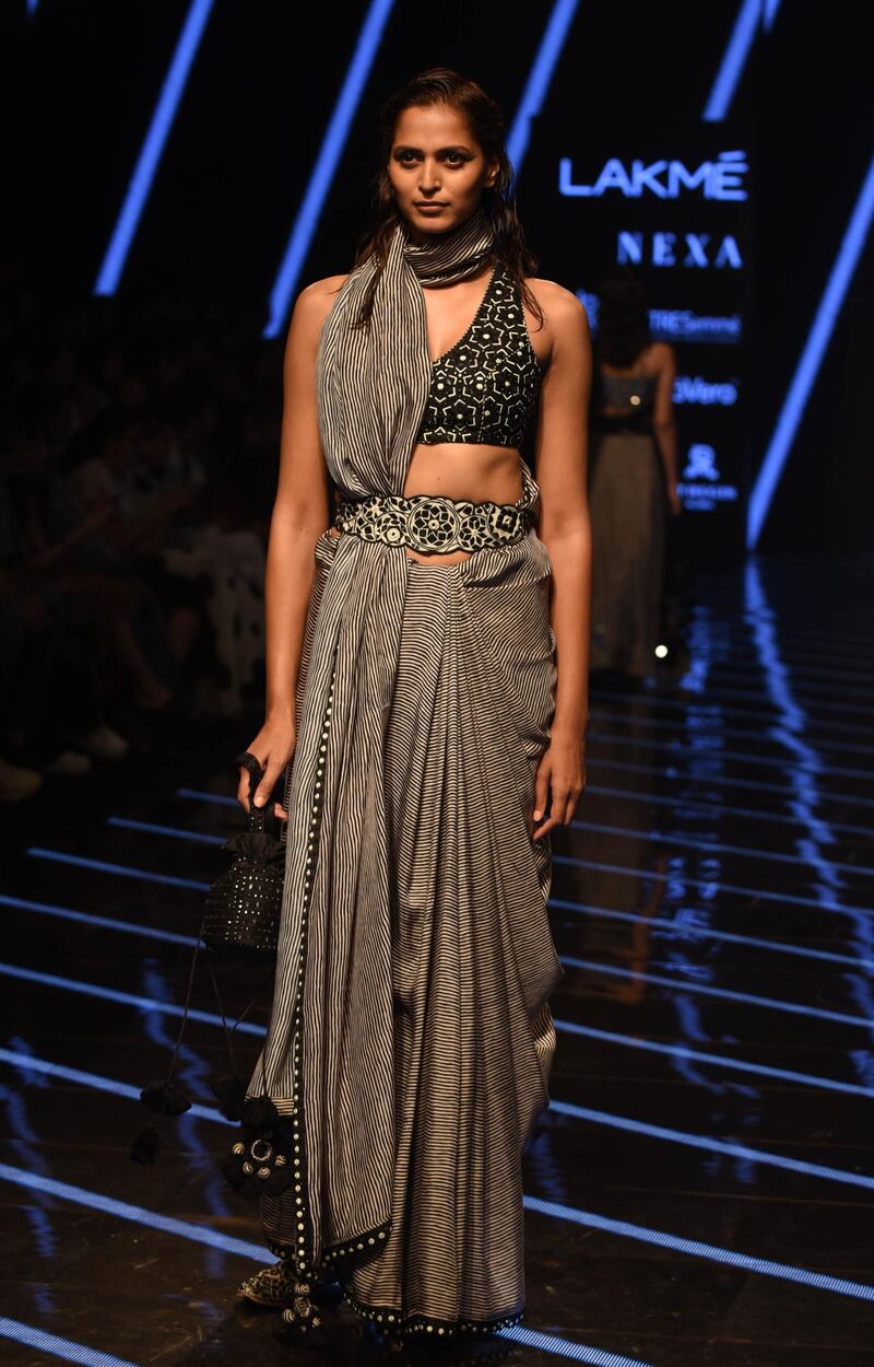A model presents creations by designer Punit Balana at Lakme Fashion Week (LFW) Winter/Festive 2019 in Mumbai on August 25, 2019.  / AFP / Sujit Jaiswal
