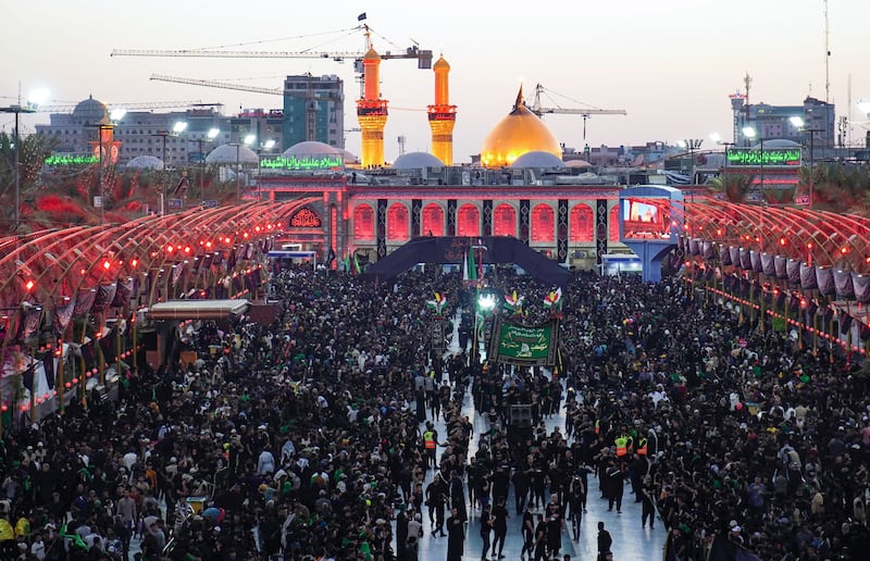 Shiite Muslim pilgrims gather at the shrine of Imam Al Abbas in the central Iraqi holy city of Karbala. AFP