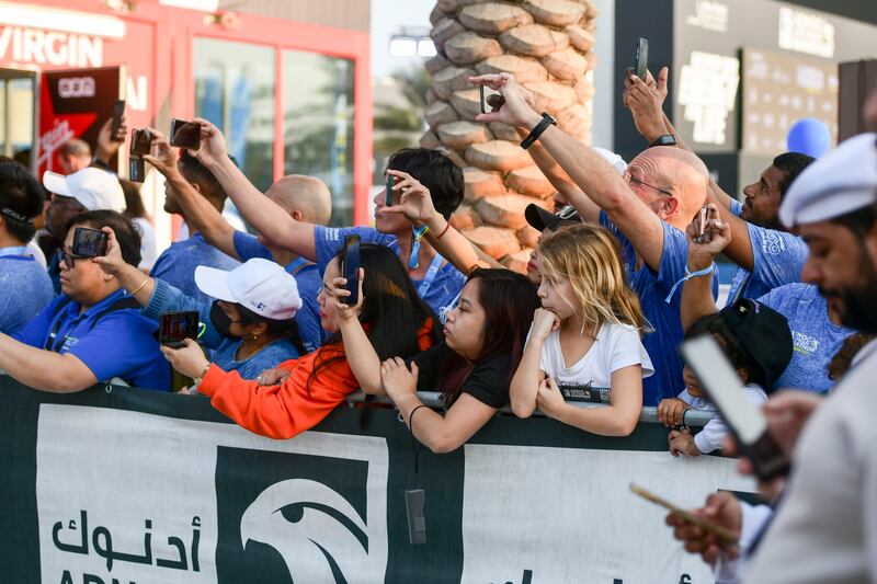 Fans cheer on the participants in Abu Dhabi. 