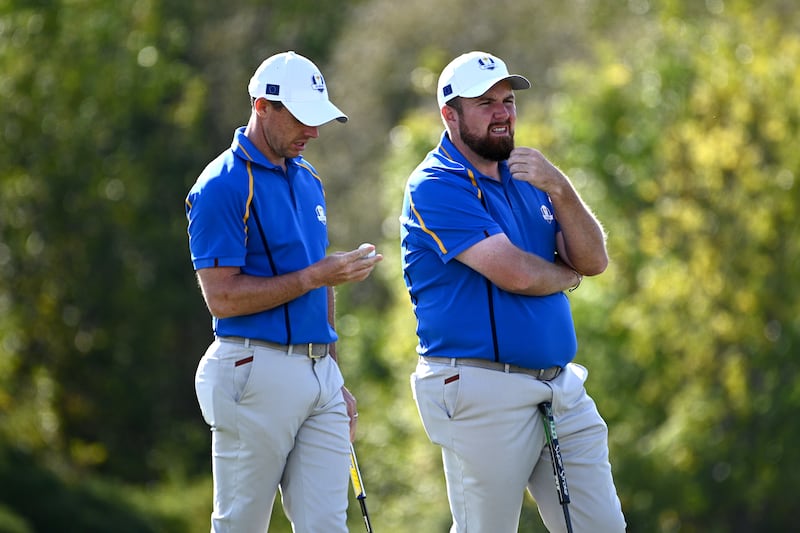 Team Europe's Rory McIlroy (left) and Shane Lowry on the 10th hole during the Afternoon Four-Ball session. Reuters