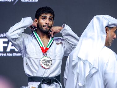 The UAE's Zayed Al Katheeri with the silver medal in the 56kg division during the 15th Abu Dhabi World Professional Jiu-Jitsu Championship. Victor Besa / The National