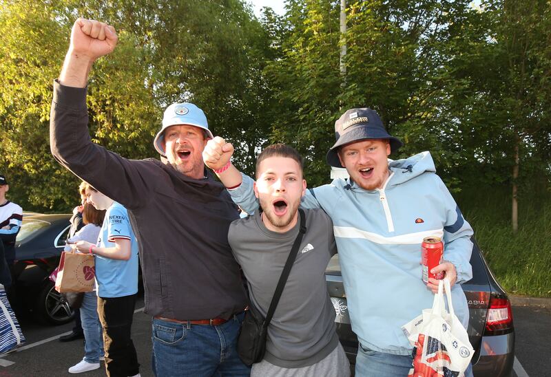 Manchester City fans leave East Didsbury Metrolink by bus to travel to Wembley Stadium ahead of the FA Cup final. PA