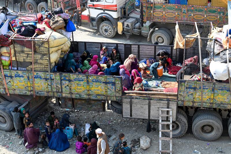 Refugees arrive in lorries at the Afghanistan-Pakistan Torkham border in Nangarhar province. AFP