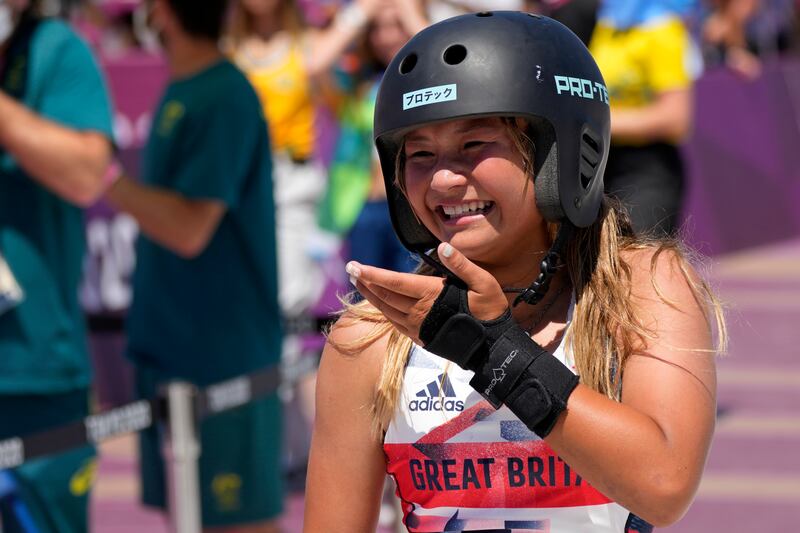 Sky Brown of Britain, 13, reacts after winning bronze in the women's park skateboarding finals.