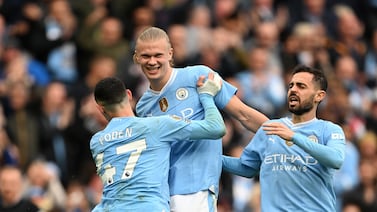 MANCHESTER, ENGLAND - MAY 04: Erling Haaland of Manchester City celebrates scoring his team's fourth goal with teammates Phil Foden and Bernardo Silva during the Premier League match between Manchester City and Wolverhampton Wanderers at Etihad Stadium on May 04, 2024 in Manchester, England. (Photo by Michael Regan / Getty Images)