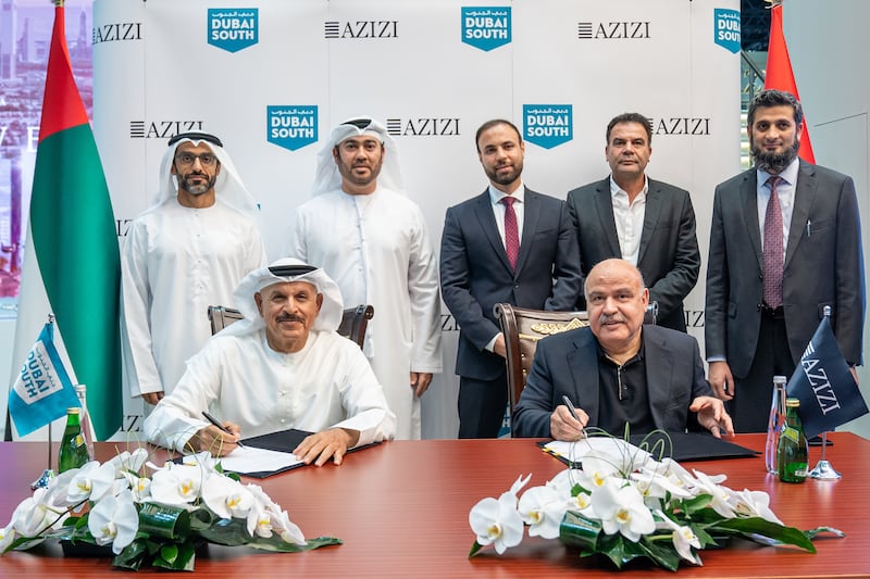 Khalifa Al Zaffin, executive chairman of the Dubai Aviation City Corporation and Dubai South, with Azizi Developments chairman Mirwais Azizi at the signing ceremony. Photo: Azizi Developments