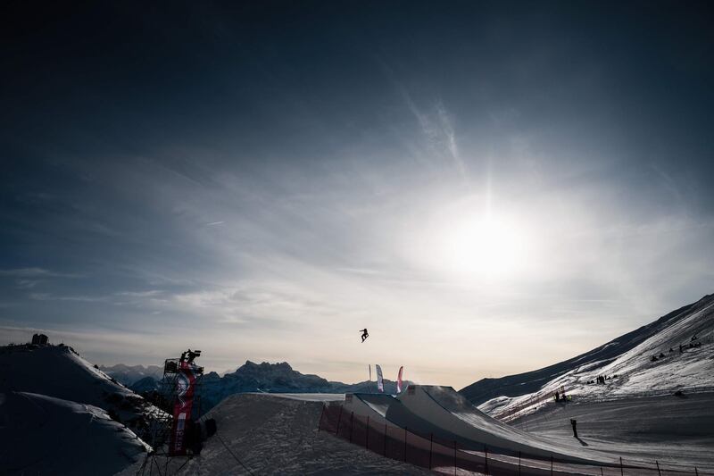 An athlete competes in the Men's Snowboard Big Air Qualification round as part of Lausanne 2020 Winter Youth Olympic Games. AFP