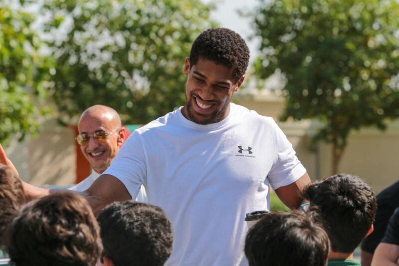 Anthony Joshua spends time with children at Misk schools ahead of his heavyweight world title fight with Andy Ruiz Jr. Courtesy Diriyah Season