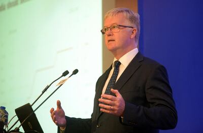 Chief Economist for the International Air Transport Association (IATA) Brian Pearce delivers a speech during a conference on Aviation Day in New Delhi on July 14, 2015. The Confedration of Indian Industry (CII) is holding a panel discussion on India's emerging aviation market. AFP PHOTO/PRAKASH SINGH (Photo by PRAKASH SINGH / AFP)