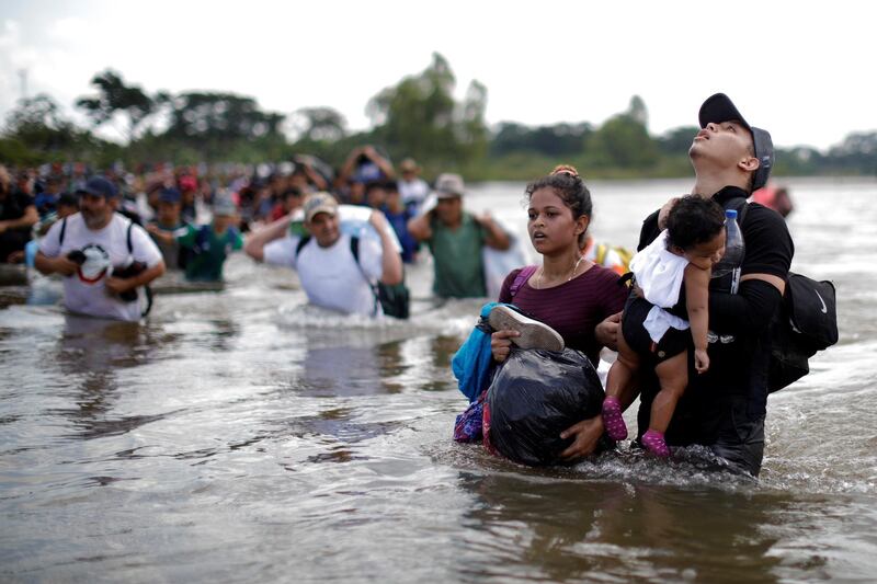 Migrants from Central America cross through the Suchiate River into Mexico from Guatemala in Ciudad Hidalgo, Mexico. Reuters