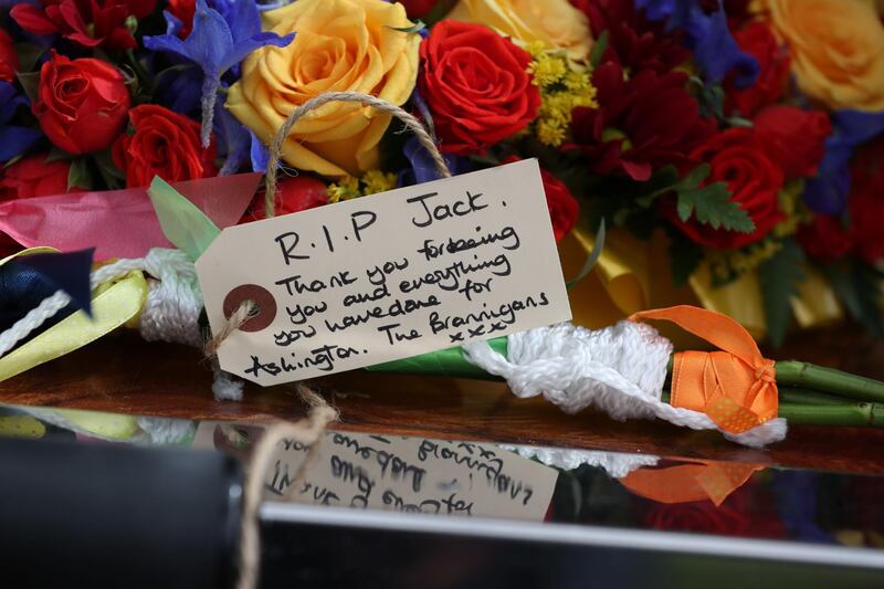 Floral tributes and messages of condolence at the West Road Crematorium. AFP