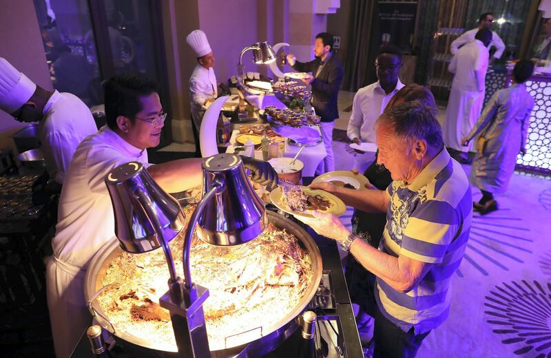 DUBAI,  UNITED ARAB EMIRATES , May 9 – 2019 :- People having Iftar food at the Fairuz Ramadan Tent at the Fairmont hotel on The Palm Jumeirah in Dubai.  ( Pawan Singh / The National ) For News/Online/Instagram. Story by Patrick 