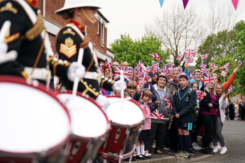 Royal Marines drummers play for residents of Church Hill near Birmingham. The nationwide celebrations will mark the 70th anniversary of the queen's accession to the throne. PA