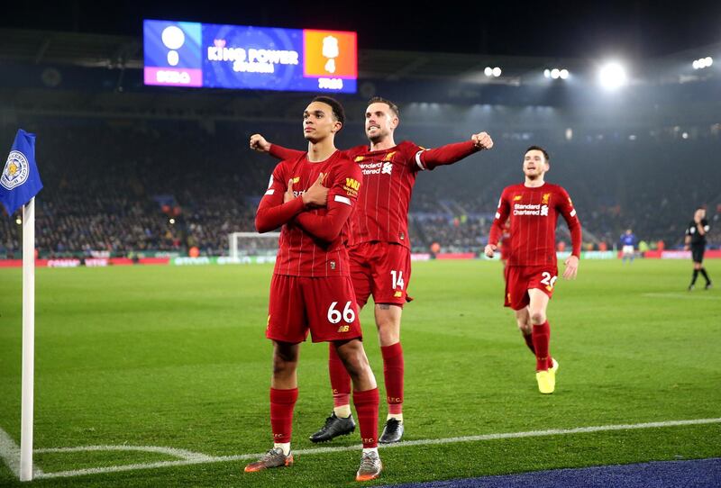 LEICESTER, ENGLAND - DECEMBER 26: Trent Alexander-Arnold of Liverpool celebrates scoring his sides fourth goal with Jordan Henderson and Andy Robertson  during the Premier League match between Leicester City and Liverpool FC at The King Power Stadium on December 26, 2019 in Leicester, United Kingdom. (Photo by Alex Pantling/Getty Images)