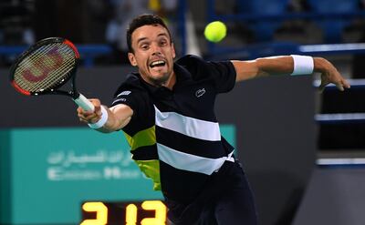 epa06410600 Spain's Roberto Bautista Agut in action against Kevin Anderson of South Africa during the final of the World Tennis Championship in Abu Dhabi, United Arab Emirates, 30 December 2017.  EPA/MARTIN DOKOUPIL