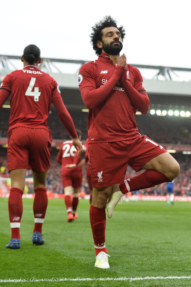 epa07506865 Liverpool's Mohamed Salah (R) celebrates with teammates after scoring the 2-0 goal during the English Premier League match between Liverpool FC and Chelsea FC at Anfield, Liverpool, Britain, 14 April 2019.  EPA/PETER POWELL EDITORIAL USE ONLY. No use with unauthorized audio, video, data, fixture lists, club/league logos or 'live' services. Online in-match use limited to 120 images, no video emulation. No use in betting, games or single club/league/player publications.