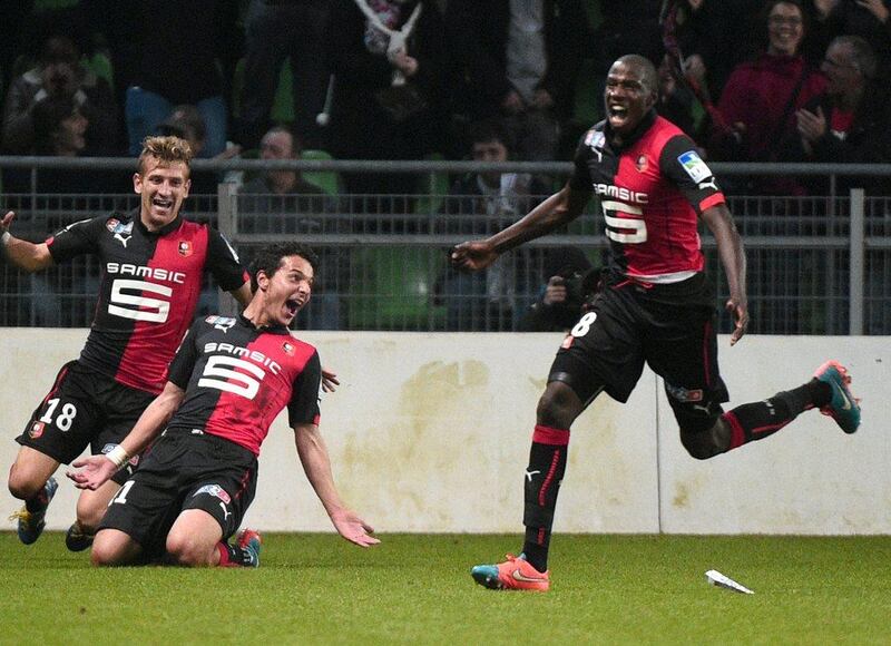 Rennes' Philipp Hosiner celebrates with teammates after scoring during the Coupe de la Ligue against Marseille on Wednesday night. Damien Meyer / AFP / October 29, 2014 