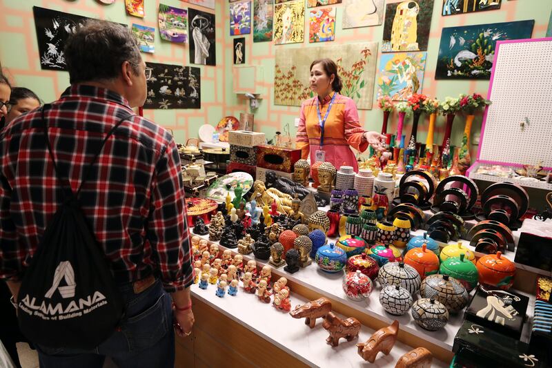 Joan Capers sells her Vietnamese gifts along the Road to Asia
