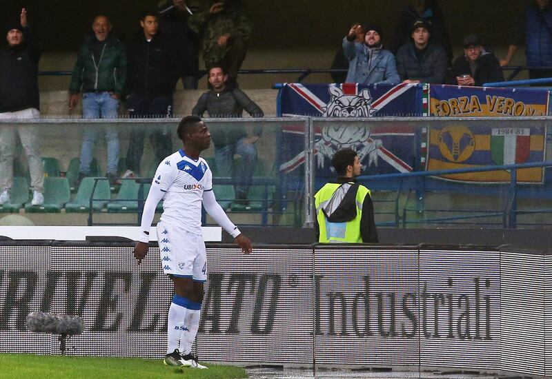 Brescia's Mario Balotelli reacts after suffering racist chants from Verona supporters. EPA
