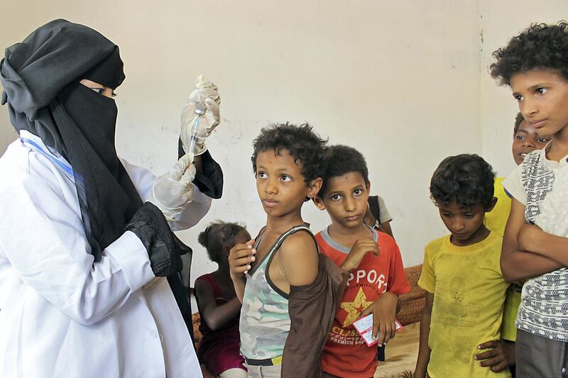 A Yemeni child receives a anti-diphtheria vaccine in a health center in the northern district of Abs, Hajjah province, on May 12, 2018. - Research published this month in The Lancet Global Health journal warned that, based on data from previous outbreaks, 54 percent of districts in Yemen could be affected by an epidemic flare-up in 2018, putting more than 13.8 million people at risk. (Photo by ESSA AHMED / AFP)