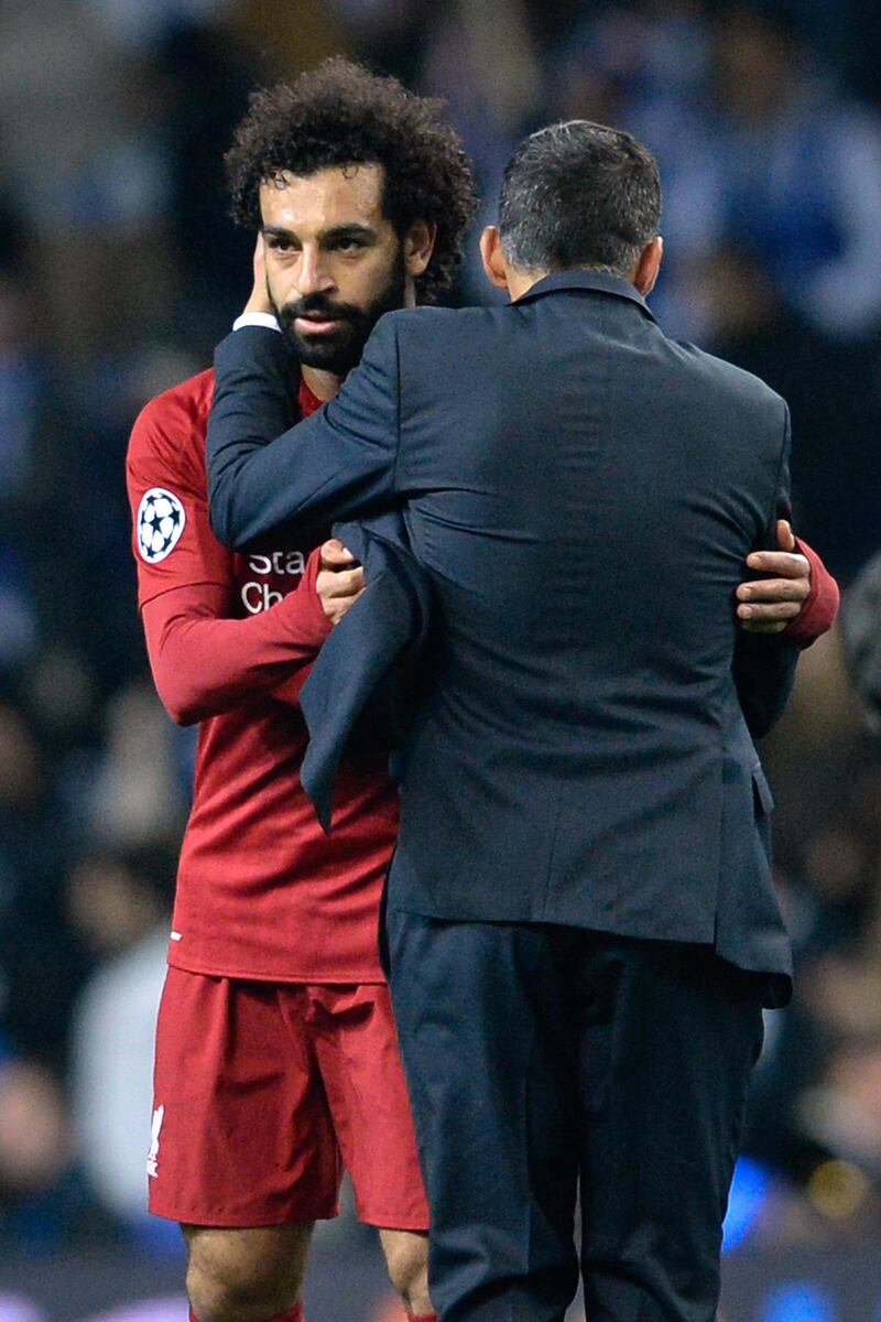 Porto manager Sergio Conceicao congratulates Salah after the match. EPA