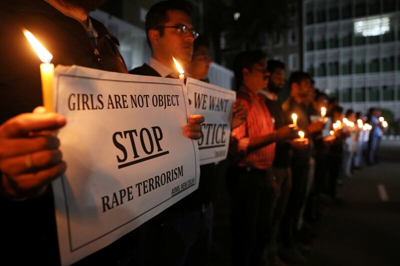 Resident doctors and medical students from All India Institute Of Medical Sciences (AIIMS) attend a candle-lit march to protest against the alleged rape and murder of a 27-year-old woman on the outskirts of Hyderabad, in New Delhi, India, December 3, 2019. REUTERS/Anushree Fadnavis