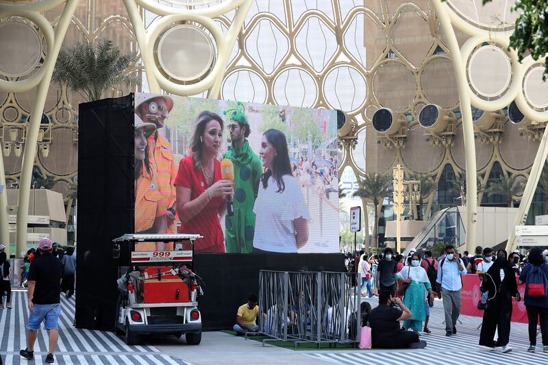 Big screens put up on the last day of the world's fair in Dubai. Pawan Singh / The National