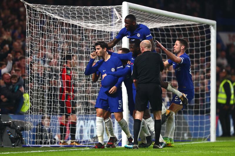 Chelsea's Alvaro Morata celebrates the winning goal with his team mates. They will now face Arsenal in the Carabao Cup Semi Final. Clive Rose / Getty Images