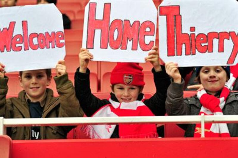 Young Arsenal fans make sure Thierry Henry knows he is always welcome at The Emirates Stadium.